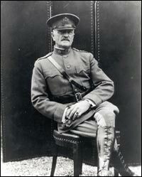 General John J. Pershing sitting in a chair